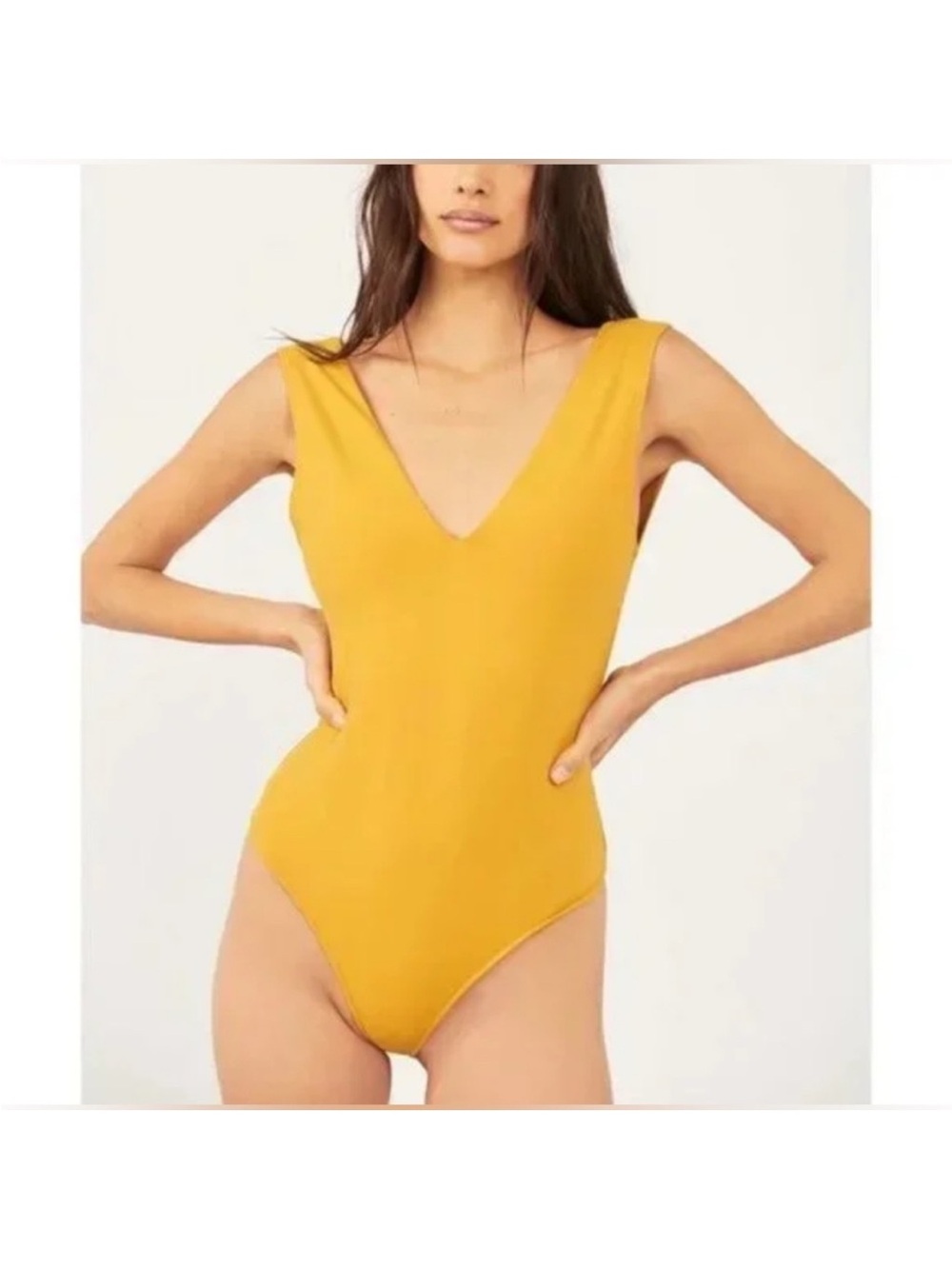 Free People keep it sleek deep V body suit